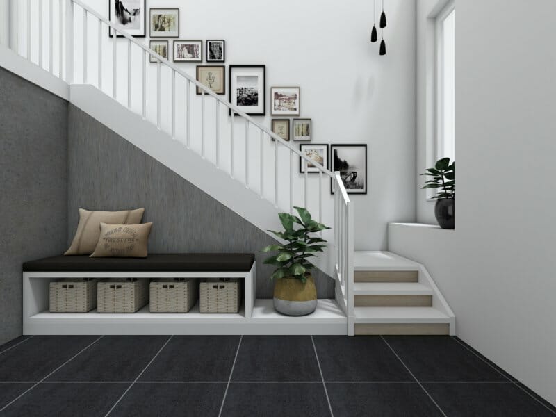 black and white stairs with photo wall