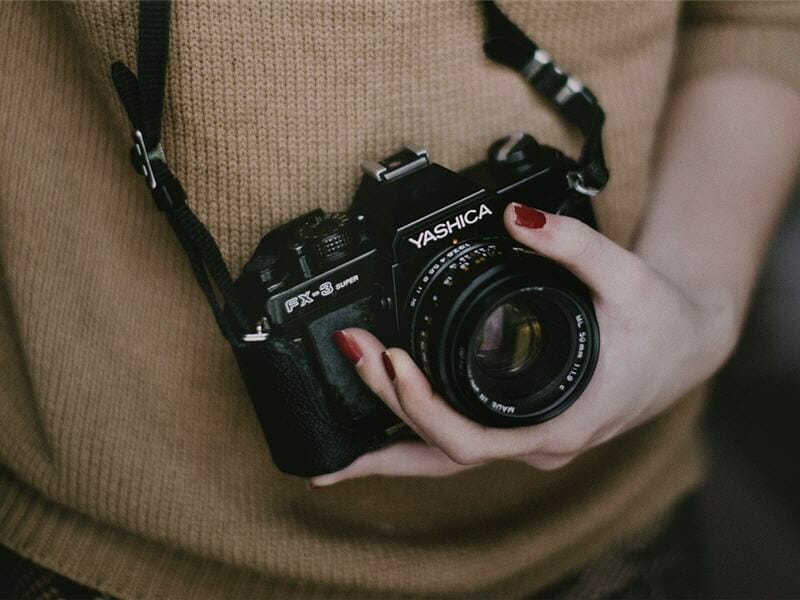 Woman holding camera